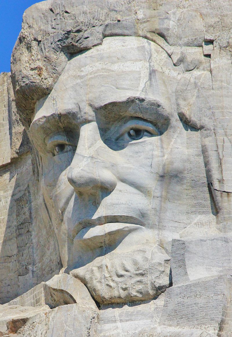 Lincoln's image is carved into the stone of Mount Rushmore
