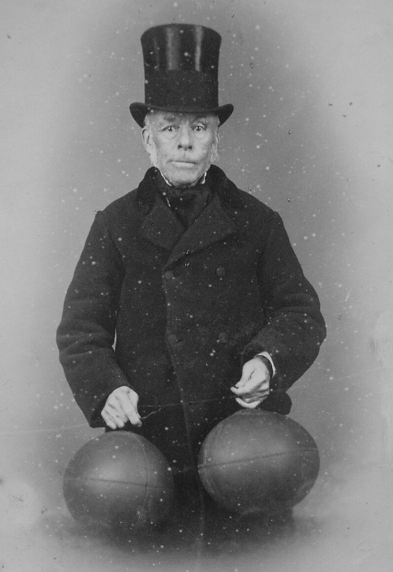 Richard Lindon with two rugby union balls in 1880