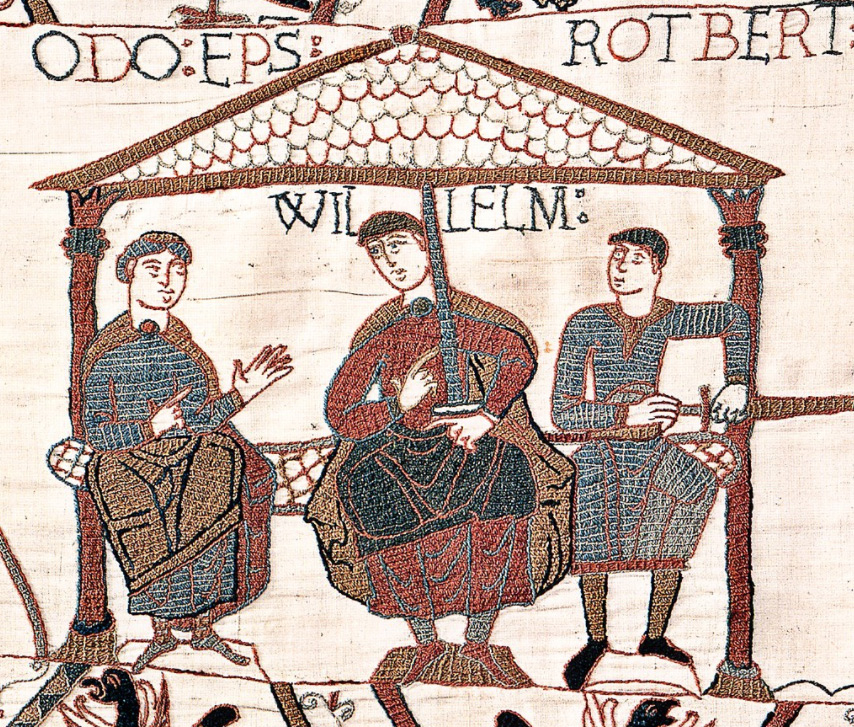 Image from the Bayeux Tapestry showing William with his half-brothers. William is in the centre, Odo is on the left with empty hands, and Robert is on the right with a sword in his hand.